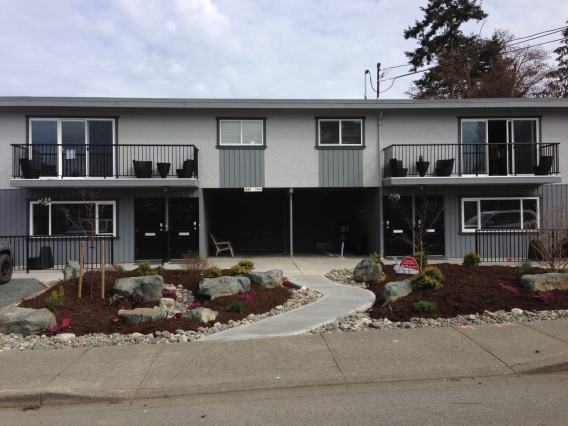 Outside of 441 Cedar 4-plex. This property features 2 x 2 bedroom and 2 x 1 bedroom suites.