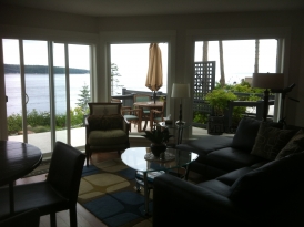 Living Room with a view of Discovery Passage in Campbell River, BC